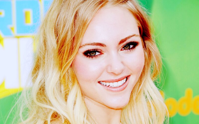 blonde woman smiling at event