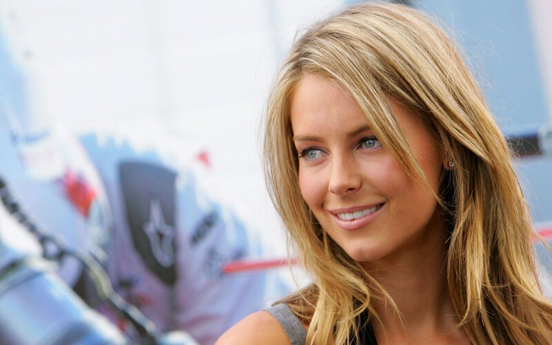 blonde woman smiling at event