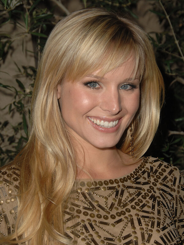 blonde woman smiling at event