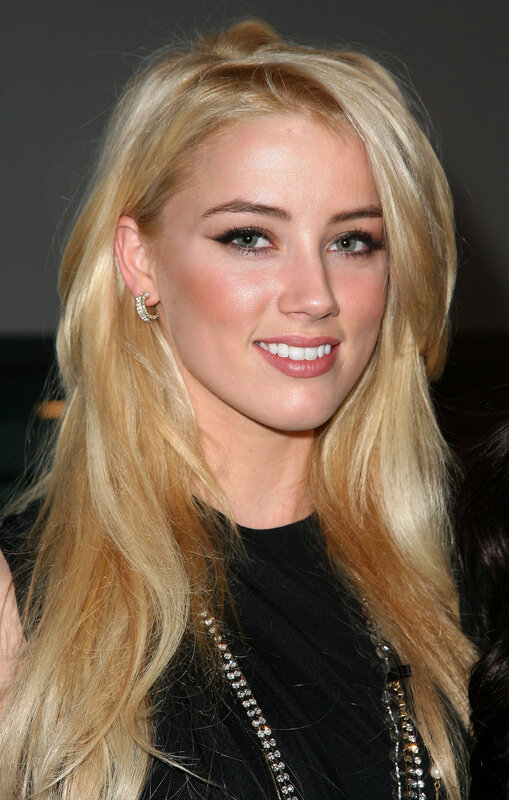blonde woman smiling at event