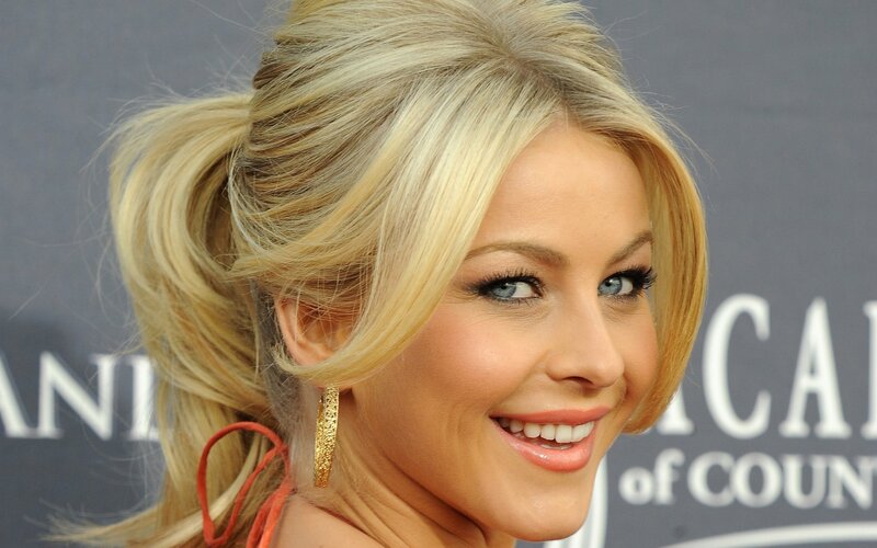 blonde woman smiling at event