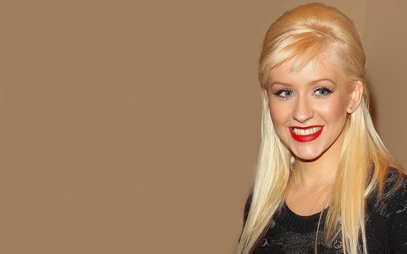 Blonde Woman Smiling — Brown