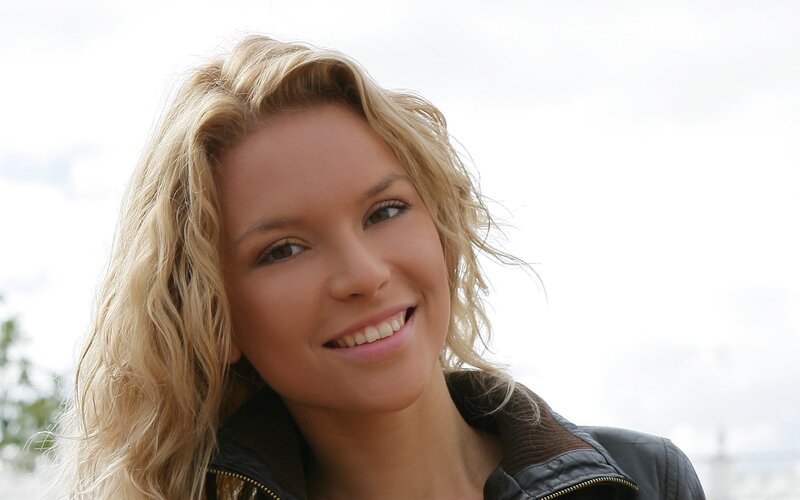 Blonde Woman Smiling — Neutral, Afternoon, Photograph