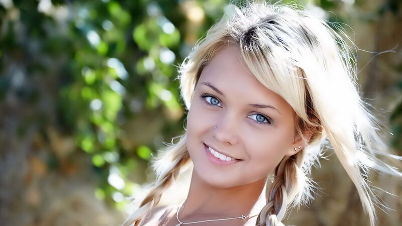 Blonde Woman Smiling — Serene