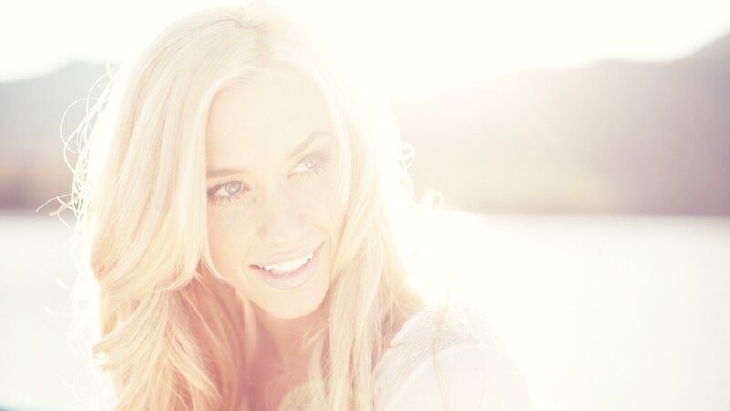 Blonde Woman Smiling — White, Serene, Sunset