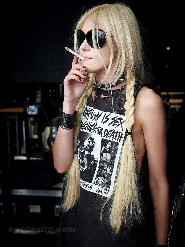 blonde woman smoking cigarette