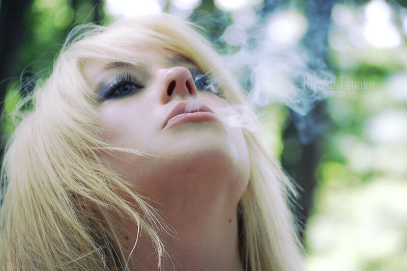Blonde Woman Smoking