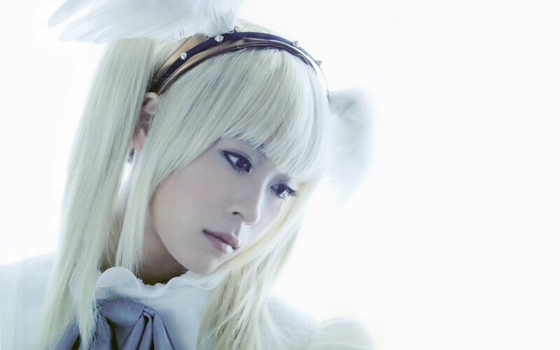 blonde woman with angel wings