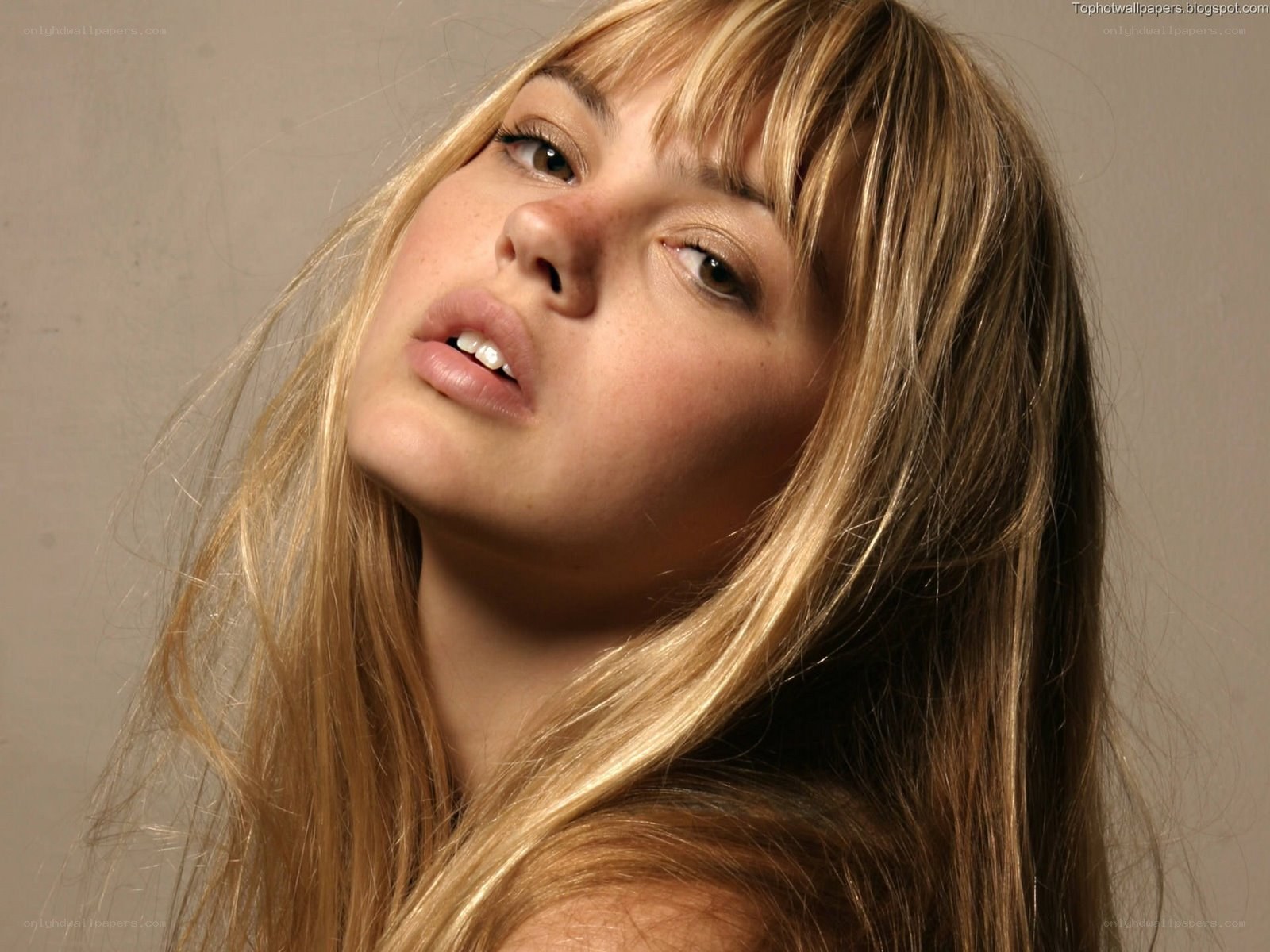 blonde woman with bangs