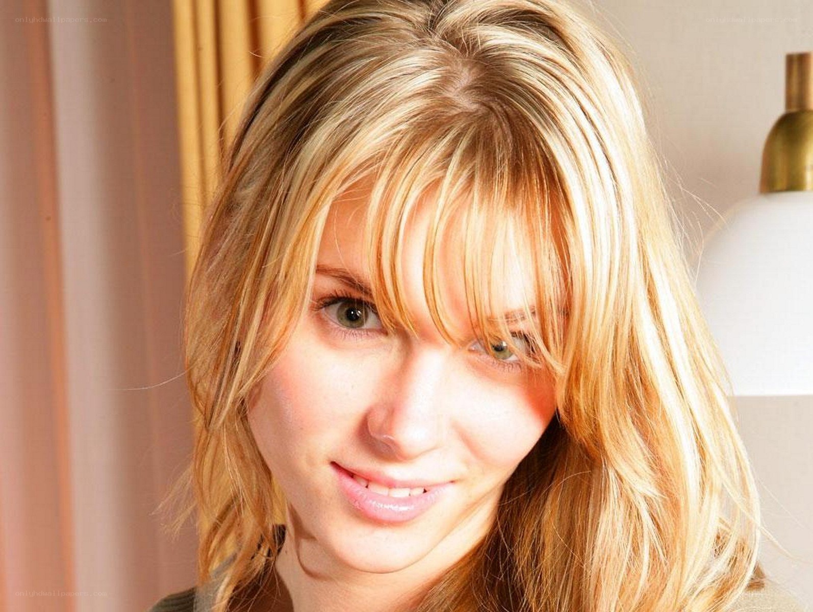 blonde woman with bangs