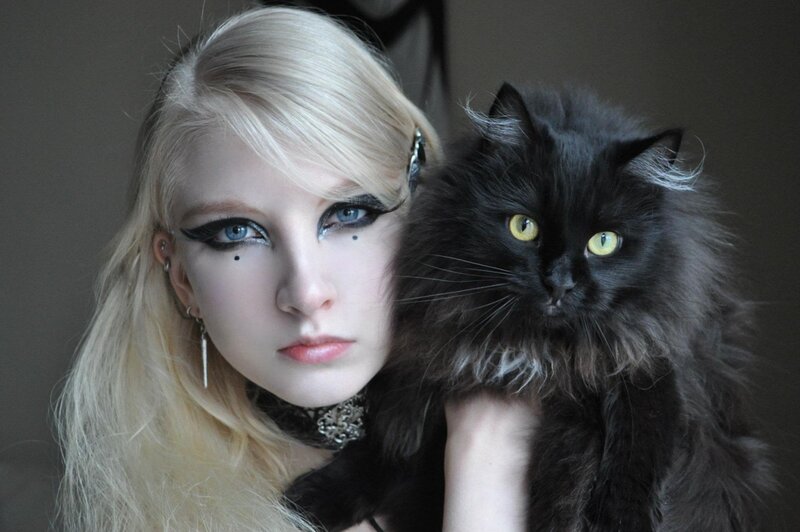 Blonde Woman with Black Cat — Dramatic