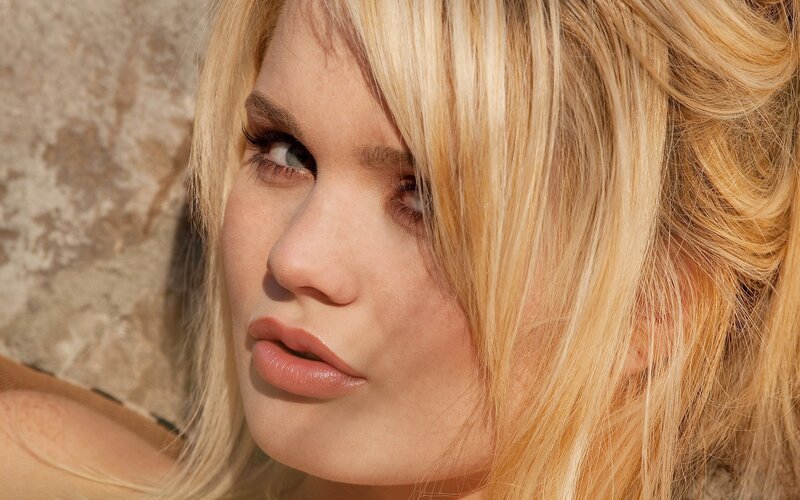 blonde woman with blue eyes