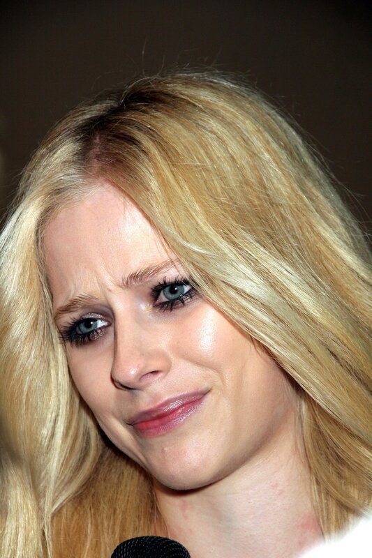 Blonde Woman with Blue Eyes — Neutral, Photograph, Microphone