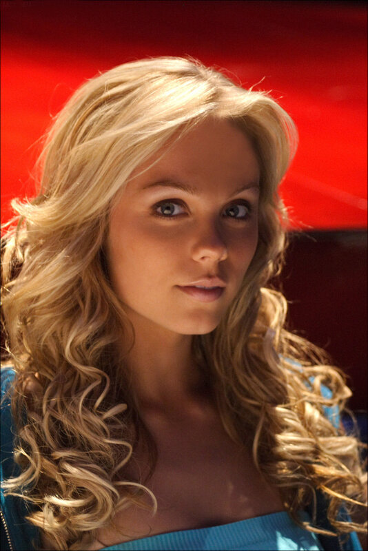 blonde woman with blue top