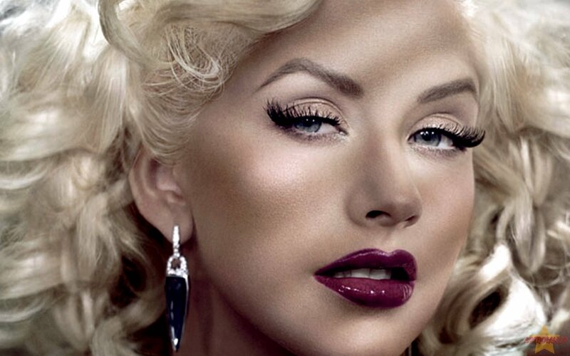 blonde woman with bold makeup