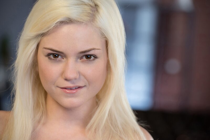 blonde woman with brown eyes