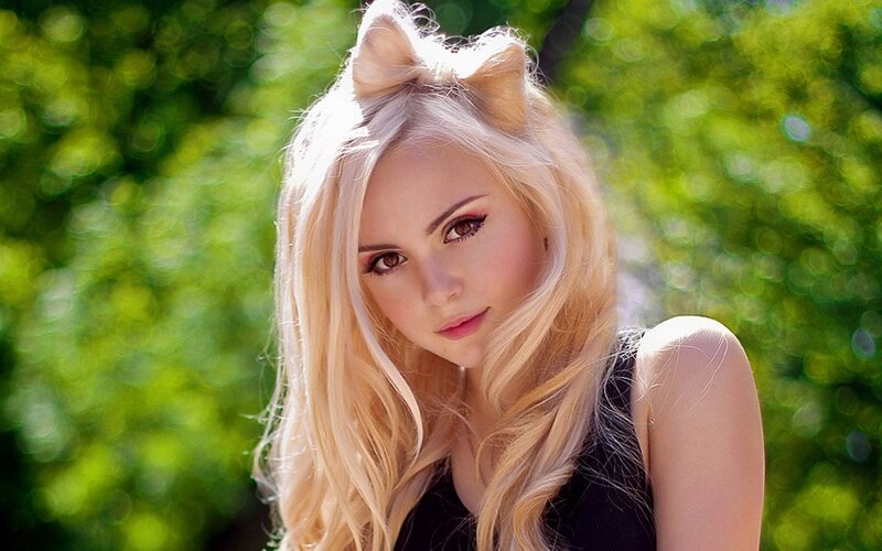 blonde woman with cat ears