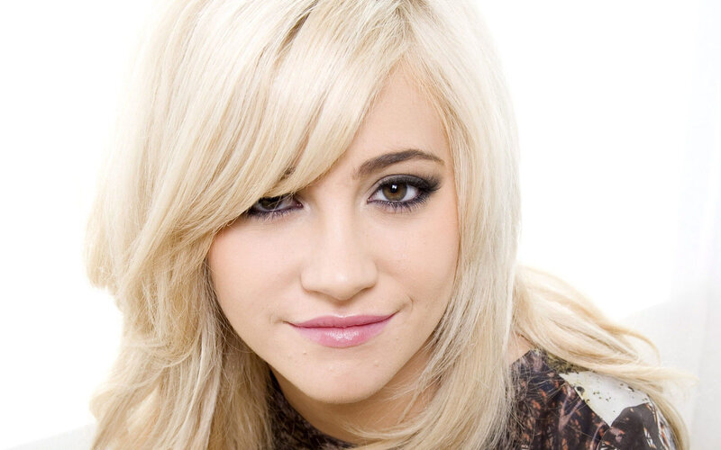 blonde woman with dark eyes