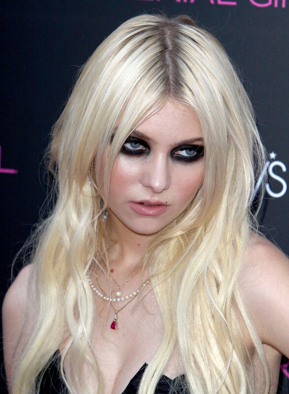 Blonde woman with dark makeup