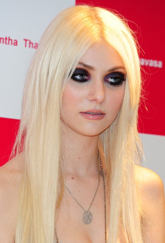 Blonde woman with dark makeup