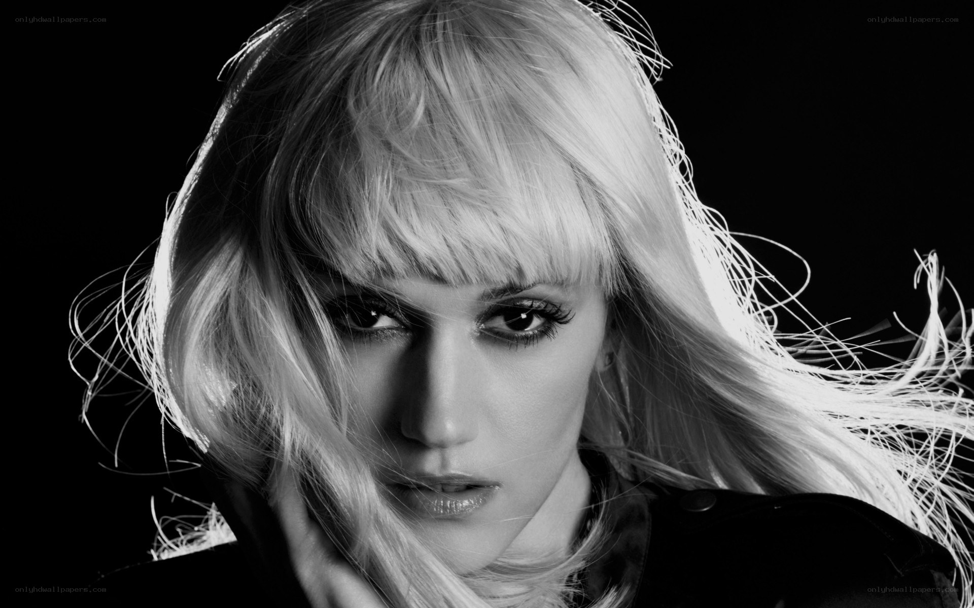blonde woman with dramatic makeup