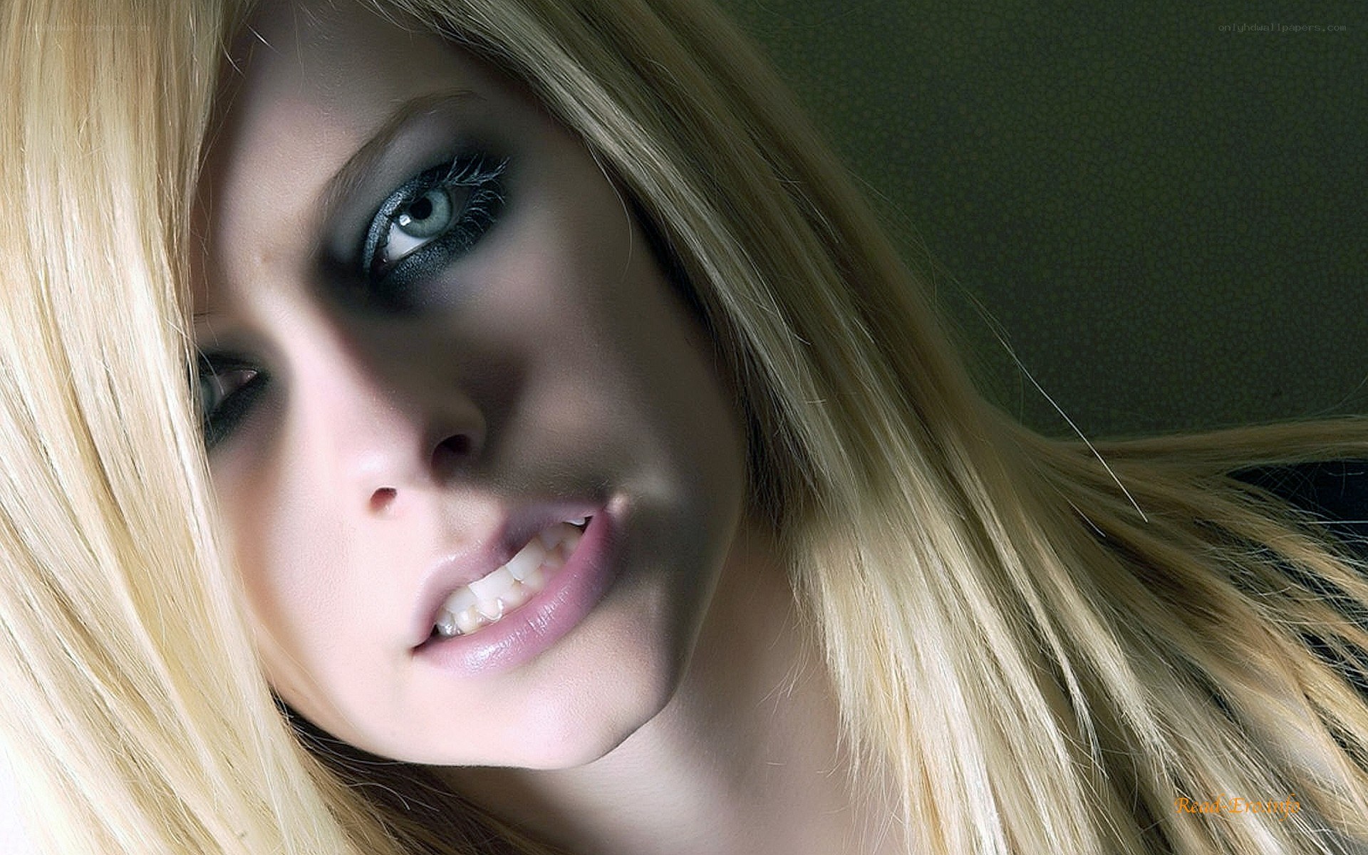 blonde woman with dramatic makeup