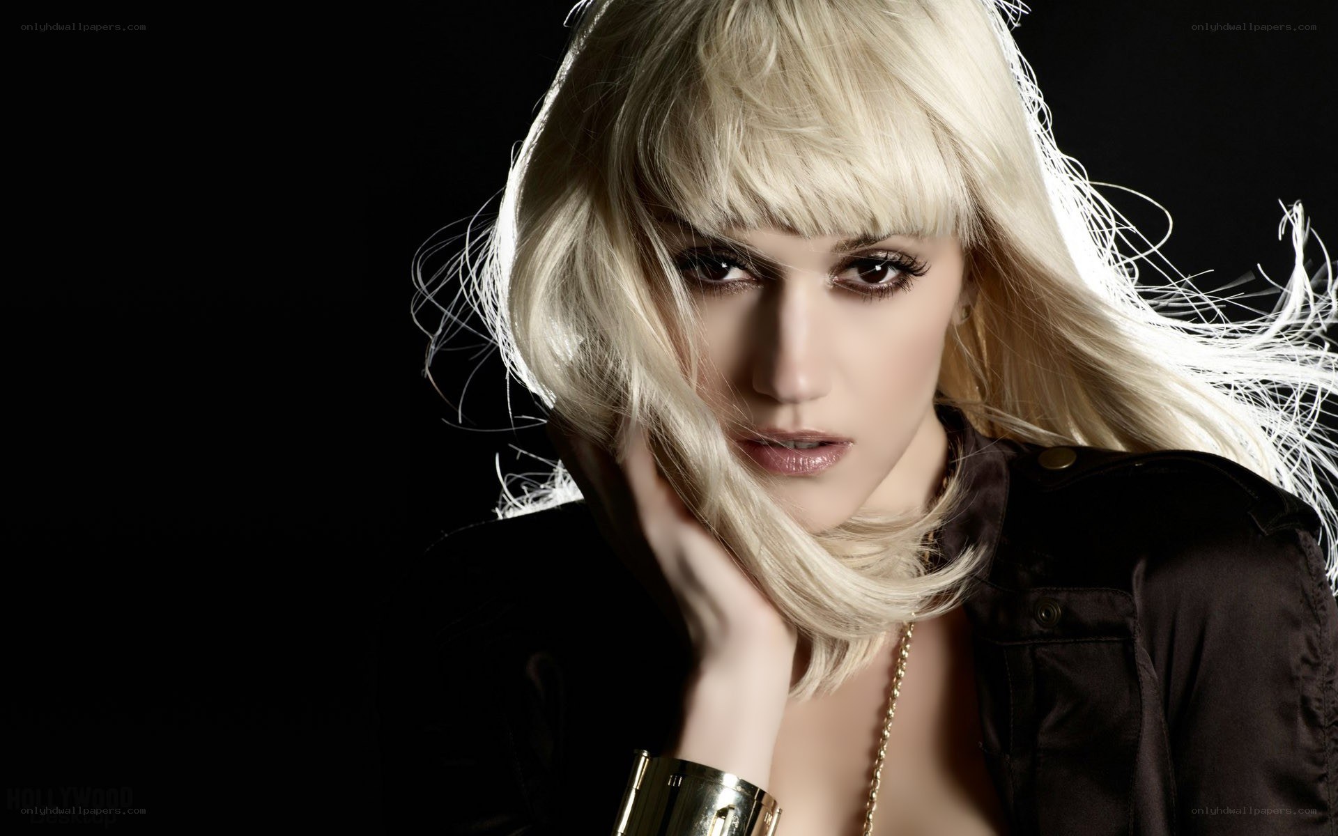 blonde woman with dramatic makeup