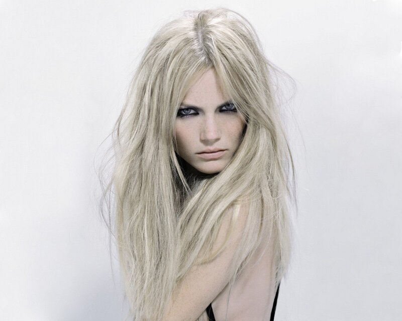 blonde woman with dramatic makeup