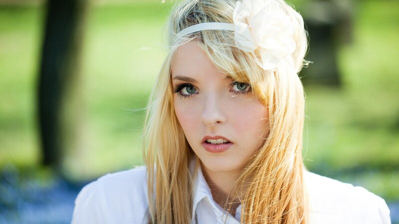 blonde woman with flower headband