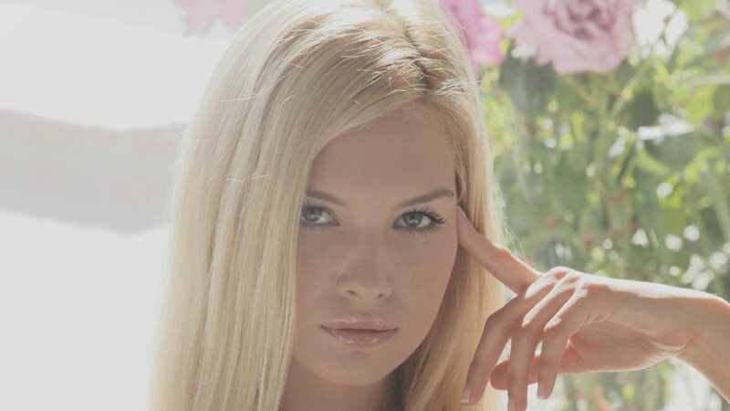 blonde woman with flowers