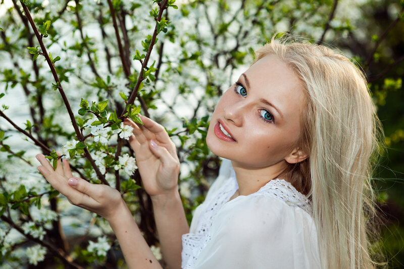 Blonde Woman with Flowers — White, Serene