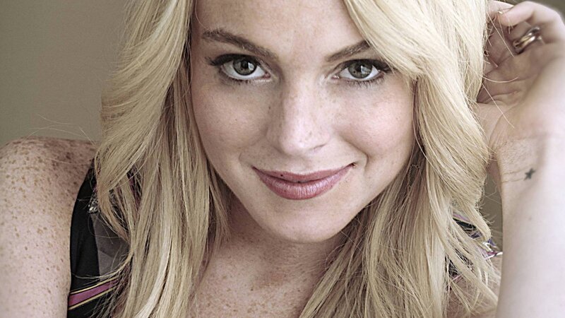 blonde woman with freckles
