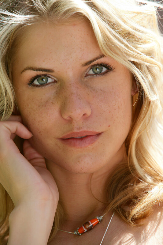 blonde woman with freckles
