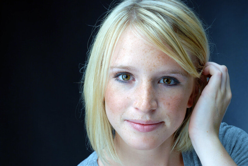 blonde woman with freckles