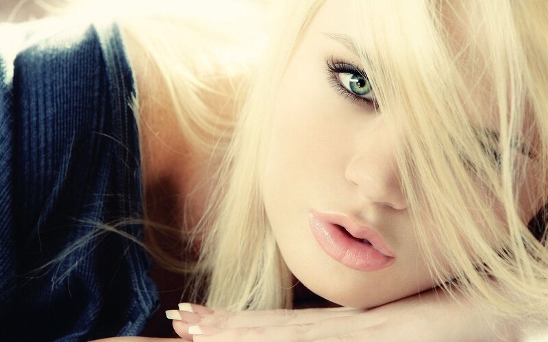 blonde woman with green eyes