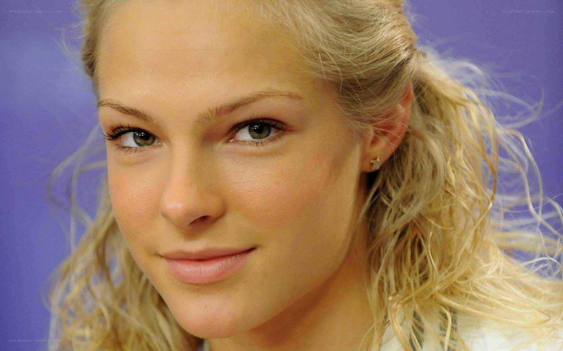 blonde woman with green eyes