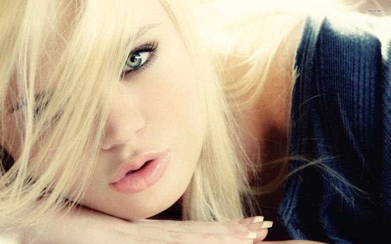 blonde woman with green eyes