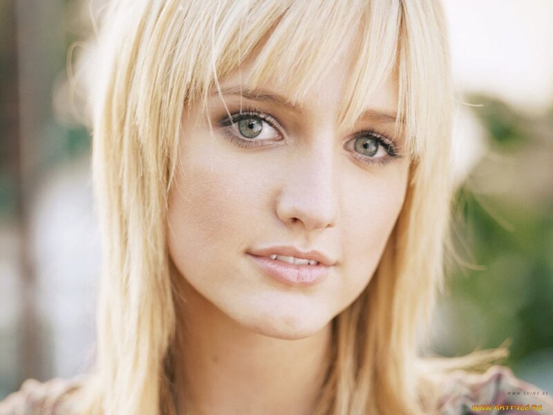 blonde woman with green eyes