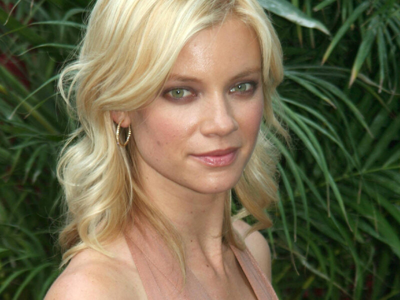 blonde woman with green eyes