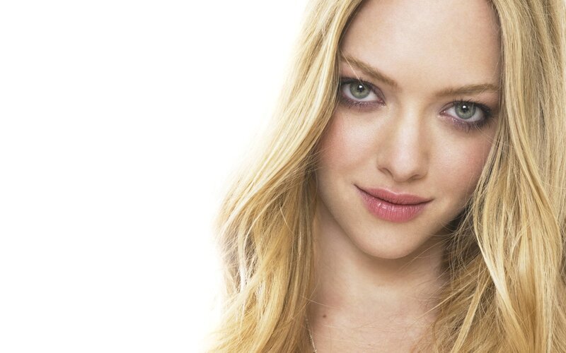 blonde woman with green eyes