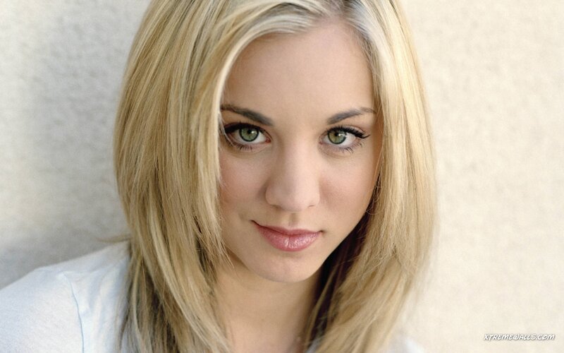 blonde woman with green eyes