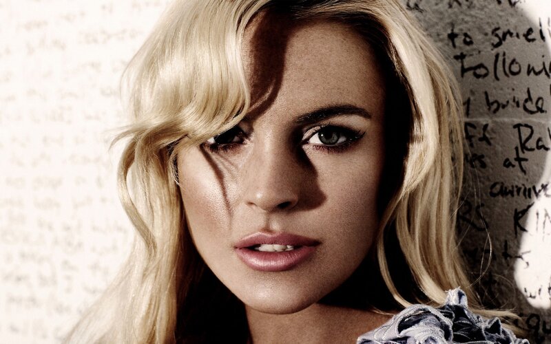 blonde woman with green eyes