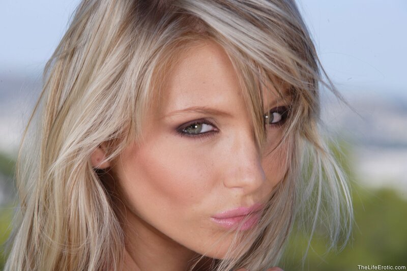 blonde woman with green eyes