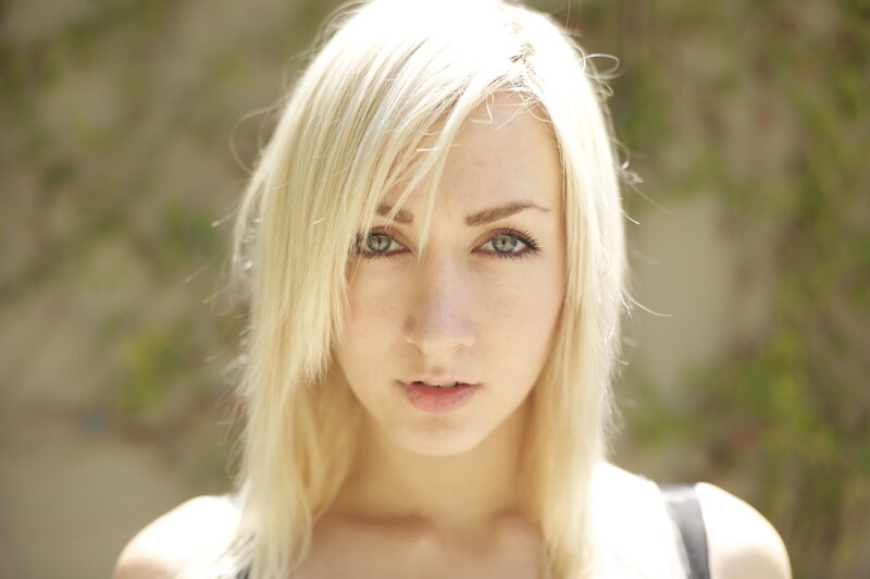 blonde woman with green eyes