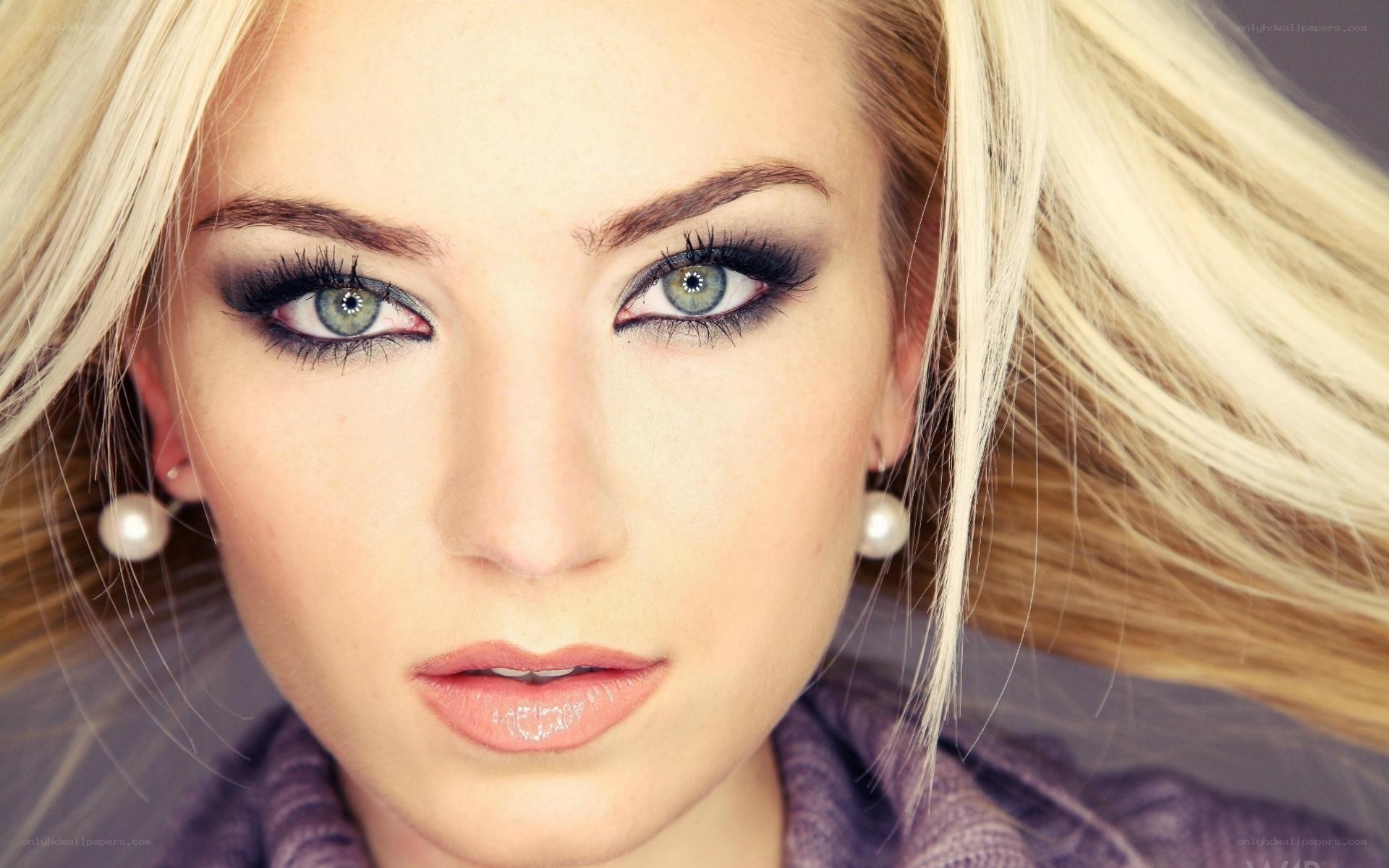 blonde woman with green eyes
