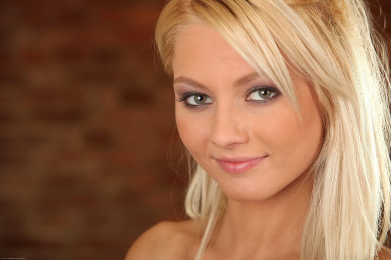 Blonde Woman with Green Eyes — Neutral, Photograph, Bricks