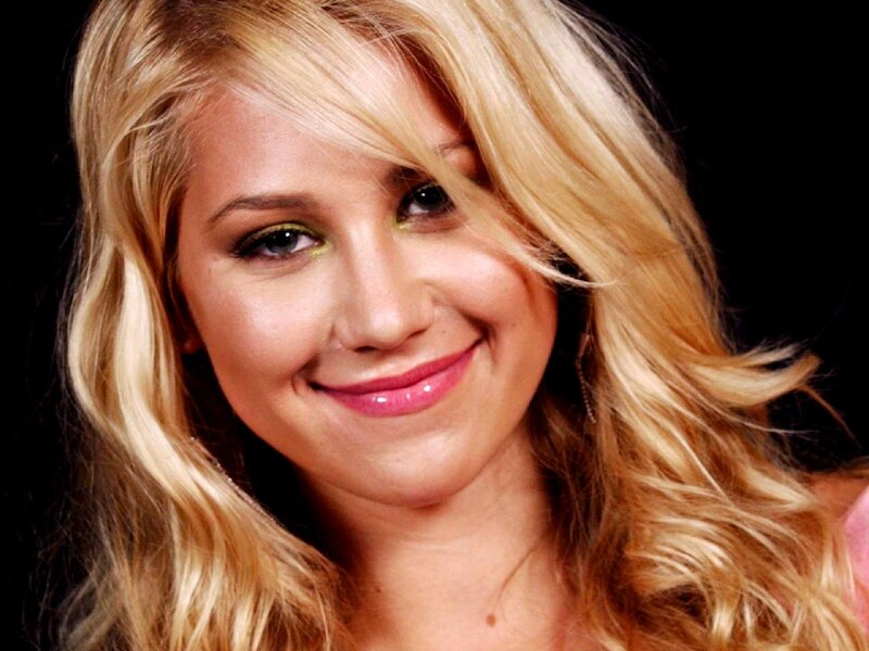 blonde woman with green eyeshadow