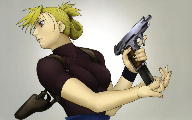 blonde woman with handgun