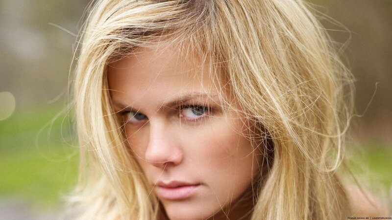 blonde woman with intense gaze
