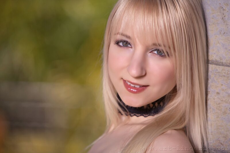 blonde woman with lace choker